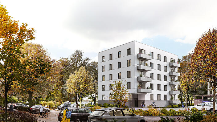 Visualisierung Neubau Hansastraße umgeben von herbstlichen Bäumen.