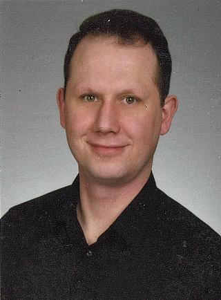 Portraitfoto Marcel Kopton.