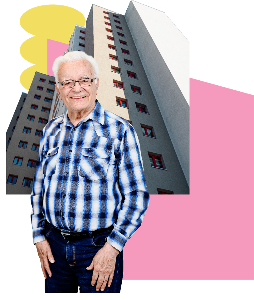 Ein Mann steht vor einem Gebäude und blickt in die Kamera, umgeben von urbaner Architektur.