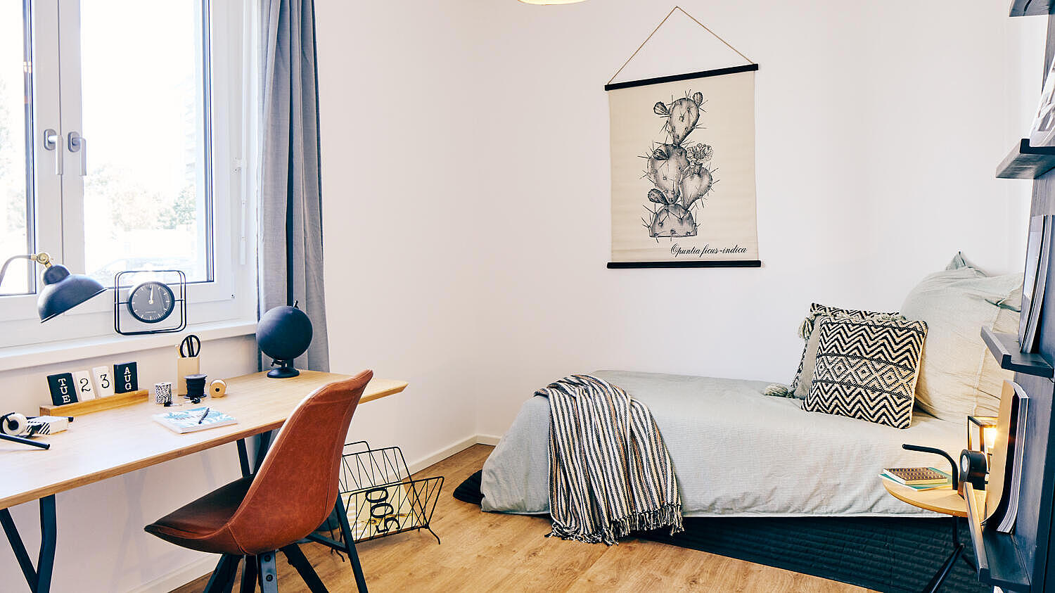 Musterwohnung im Quartier Stadtgut Hellersdorf: möbliertes Schlafzimmer mit Einzelbett